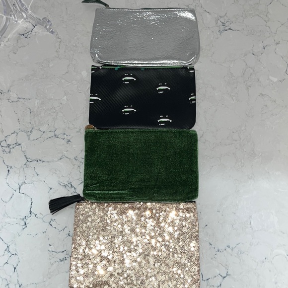 ipsy Handbags - Ipsy “Night out on the town” set of four makeup bags.